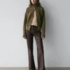 Pantalones acampanados encerados Pantalones acampanados encerados