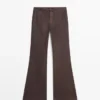 Pantalones acampanados encerados Pantalones acampanados encerados