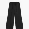 Pantalones cortos de pierna ancha de lana elástica Pantalones cortos de pierna ancha de lana elástica