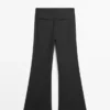 Pantalones de corte acampanado a rayas Pantalones de corte acampanado a rayas