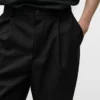Pantalones de corte holgado con pinzas en mezcla de lana fresca Pantalones de corte holgado con pinzas en mezcla de lana fresca