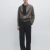 Pantalones de corte holgado en mezcla de lana con pinzas Pantalones de corte holgado en mezcla de lana con pinzas