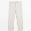 Pantalones de lino ligeros con detalle en espiga Pantalones de lino ligeros con detalle en espiga