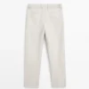 Pantalones de lino ligeros con detalle en espiga Pantalones de lino ligeros con detalle en espiga