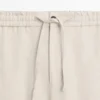 Pantalones de lino Total Look con detalle en la cintura Pantalones de lino Total Look con detalle en la cintura
