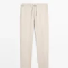 Pantalones de lino Total Look con detalle en la cintura Pantalones de lino Total Look con detalle en la cintura
