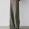 Pantalones de pierna ancha con detalles a rayas Pantalones de pierna ancha con detalles a rayas