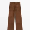 Pantalones de pierna ancha de piel de ante con bolsillos Pantalones de pierna ancha de piel de ante con bolsillos