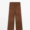 Pantalones de pierna ancha de piel de ante con bolsillos Pantalones de pierna ancha de piel de ante con bolsillos