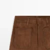 Pantalones de pierna ancha de piel de ante con bolsillos Pantalones de pierna ancha de piel de ante con bolsillos