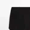 Pantalones de seda fluidos en contraste Pantalones de seda fluidos en contraste
