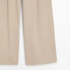 Pantalones de talle alto y corte holgado Pantalones de talle alto y corte holgado
