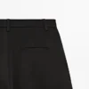 Pantalones fluidos con detalles plisados Pantalones fluidos con detalles plisados