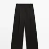 Pantalones fluidos con detalles plisados Pantalones fluidos con detalles plisados