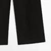 Pantalones fluidos con detalles plisados Pantalones fluidos con detalles plisados