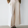 Pantalones fluidos con dobladillos Pantalones fluidos con dobladillos
