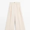 Pantalones fluidos con dobladillos Pantalones fluidos con dobladillos