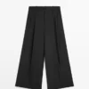 Pantalones fluidos con pinzas Pantalones fluidos con pinzas