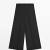 Pantalones fluidos con pinzas Pantalones fluidos con pinzas