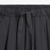 Pantalones plisados de pierna ancha y voluminosa Pantalones plisados de pierna ancha y voluminosa