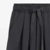 Pantalones plisados de pierna ancha y voluminosa Pantalones plisados de pierna ancha y voluminosa