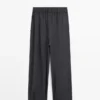 Pantalones plisados de pierna ancha y voluminosa Pantalones plisados de pierna ancha y voluminosa