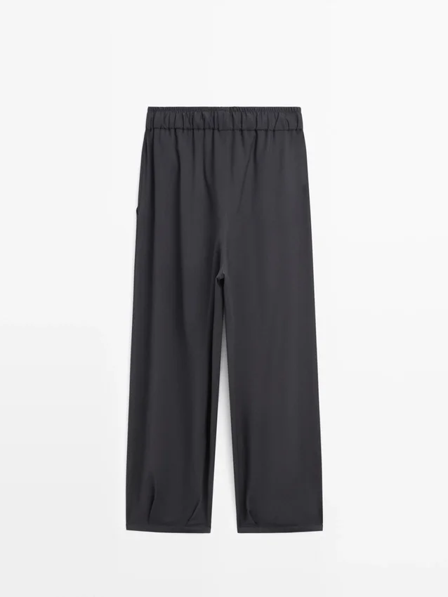 Pantalones plisados de pierna ancha y voluminosa Pantalones plisados de pierna ancha y voluminosa