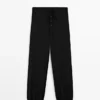 Pantalones sarouel de lana con detalle de lazo Pantalones sarouel de lana con detalle de lazo