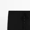 Pantalones sarouel de lana con detalle de lazo Pantalones sarouel de lana con detalle de lazo