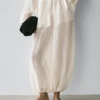Pantalones sarouel fluidos con detalle plisado Pantalones sarouel fluidos con detalle plisado