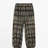 Pantalones sarouel fluidos estampados Pantalones sarouel fluidos estampados