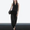 Pantalones sarouel semitransparentes con detalles de botones Pantalones sarouel semitransparentes con detalles de botones