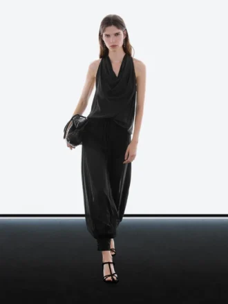 Pantalones sarouel semitransparentes con detalles de botones