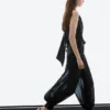 Pantalones sarouel semitransparentes con detalles de botones Pantalones sarouel semitransparentes con detalles de botones