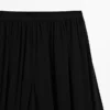 Pantalones sarouel semitransparentes con detalles de botones Pantalones sarouel semitransparentes con detalles de botones