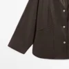 Parka tipo capa de piel napa con bolsillos Parka tipo capa de piel napa con bolsillos