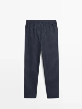 Top de pijama de manga corta y pantalones a rayas