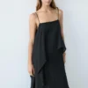 Vestido midi con detalle de volantes asimétricos Vestido midi con detalle de volantes asimétricos