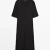Vestido midi con detalle en las mangas Vestido midi con detalle en las mangas