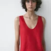 Vestido midi de lino con tirantes Vestido midi de lino con tirantes