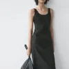 Vestido midi fluido con cuello redondo Vestido midi fluido con cuello redondo