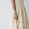 Vestido midi fluido con detalle plisado Vestido midi fluido con detalle plisado