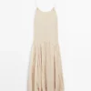 Vestido midi fluido con detalle plisado Vestido midi fluido con detalle plisado