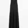 Vestido midi plisado y fluido Vestido midi plisado y fluido