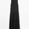 Vestido midi plisado y fluido Vestido midi plisado y fluido