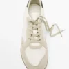 Zapatillas con pieza trasera en contraste Zapatillas con pieza trasera en contraste