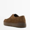 Zapatos de cuero con puntera moc y suela gruesa Zapatos de cuero con puntera moc y suela gruesa